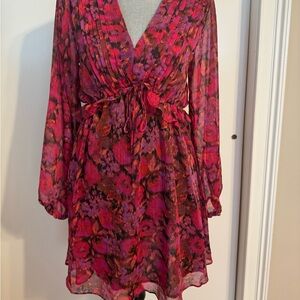 Pink pattern babydoll dress with silver flec running through it. NWT